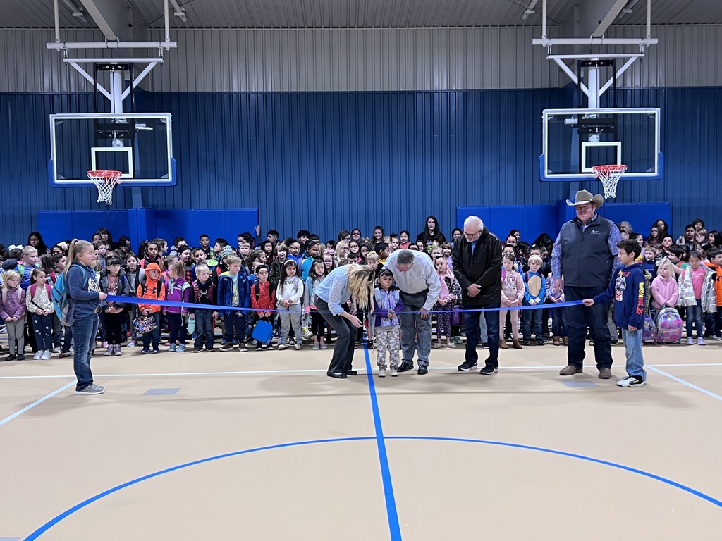 students in new elementary gym at ribbon cutting